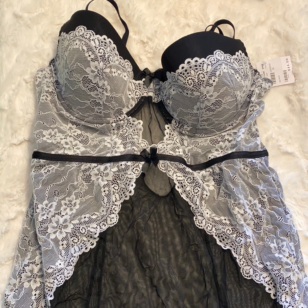 Black with white lace never worn Frederick’s of Hollywood lingerie with bra top